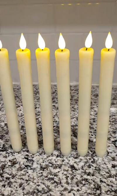 Seks tente Velora Flamme lys på en kjøkkenbenk hjemme hos en kunde
