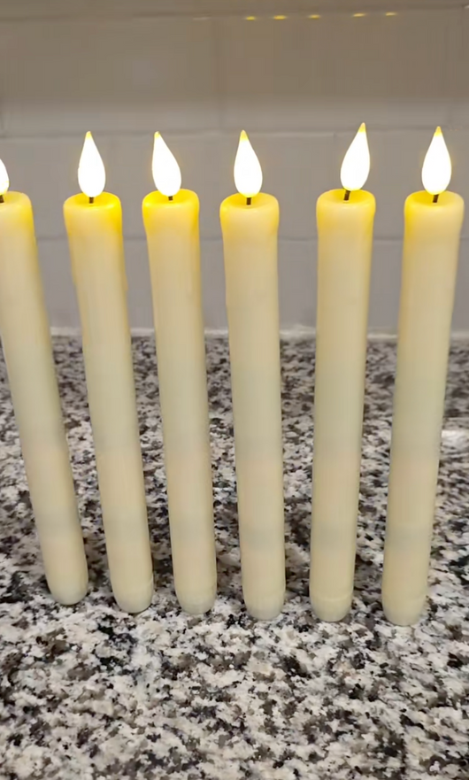 Seks tente Velora Flamme lys på en kjøkkenbenk hjemme hos en kunde