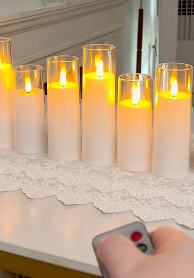 Kunde styrer Velora Flamme lysene med fjernkontrollen
