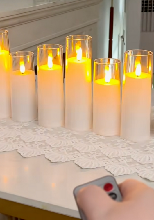 Kunde styrer Velora Flamme lysene med fjernkontrollen